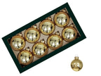 Boite de boules de noël doré