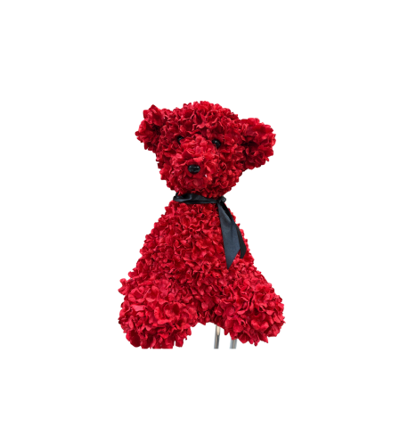 Ours en fleurs rouge assis